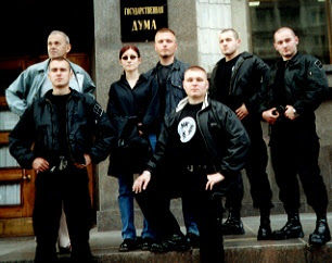 Polish neo-Nazis visiting Moscow in August 2000. Piskorski is in the center, together with his current girlfriend. ~